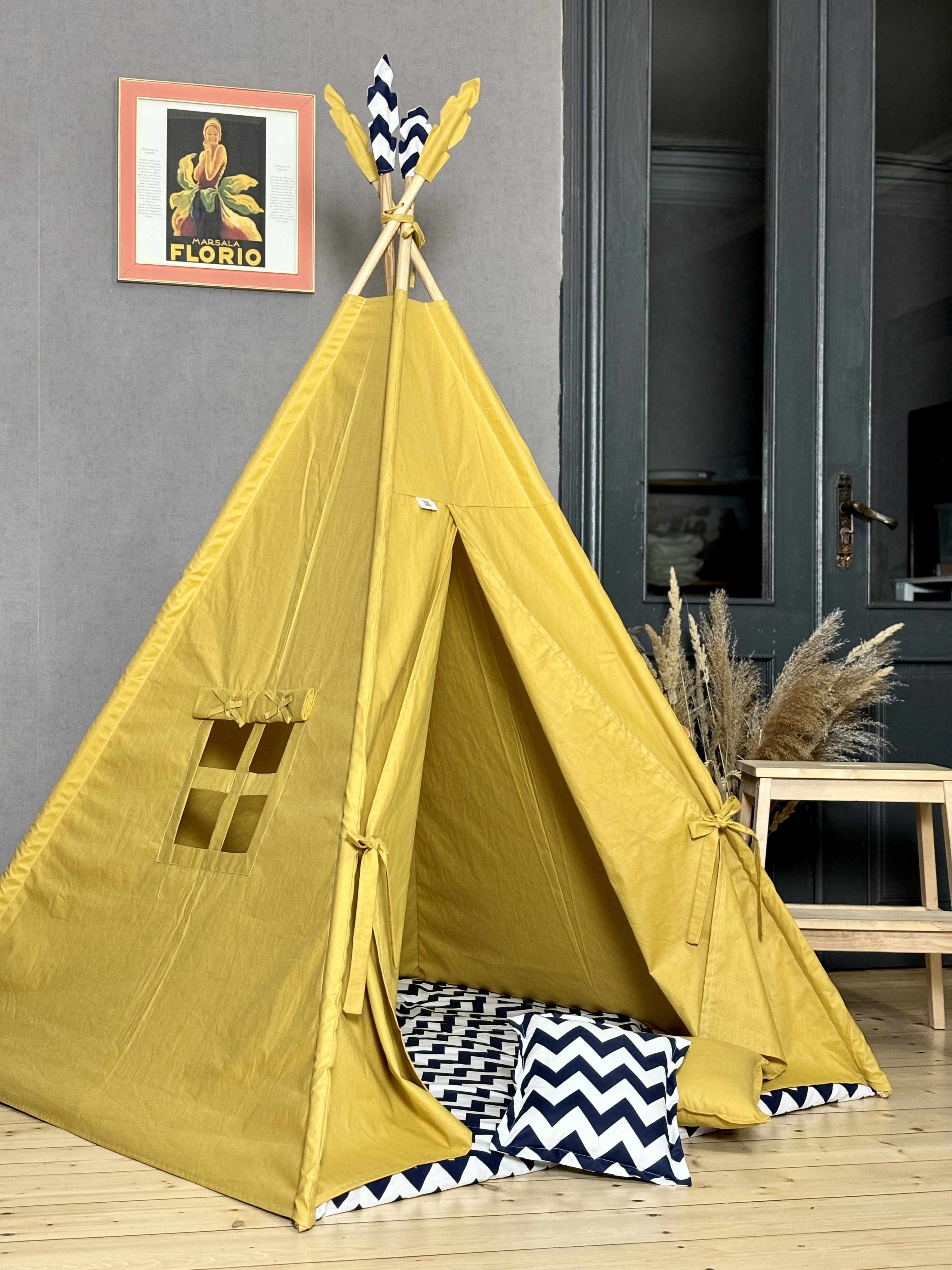 Yellow tent with blue zigzag lining